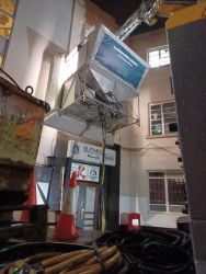 The stone cleaning process at Richmond station in action at night - South Western Railway