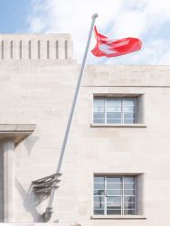 One of the new flag poles in situ Richmond station - South Western Railway