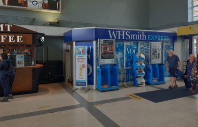 Shop front at Richmond station before restoration - South Western Railway