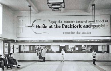 A view of the original lighting chandeliers in place at Richmond station - South Western Railway