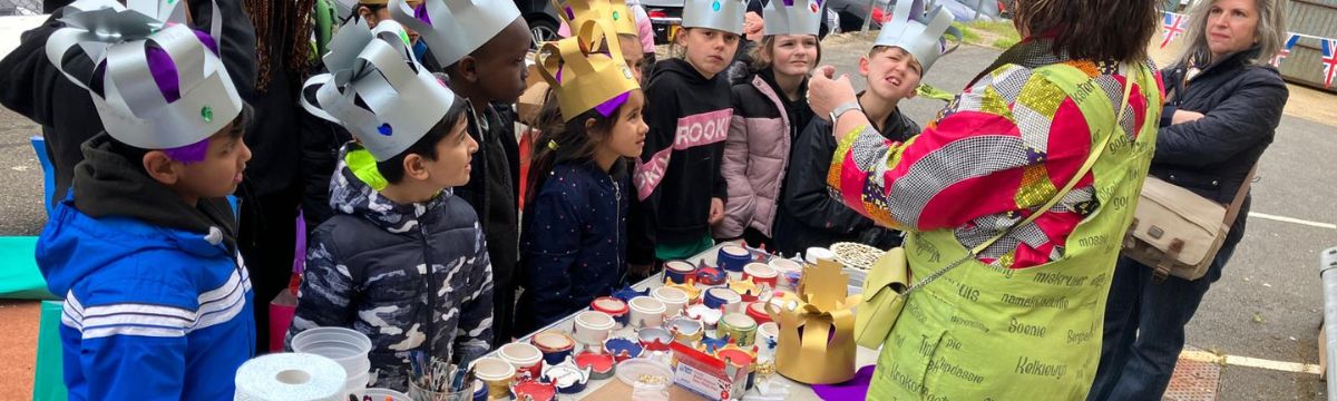 Community rail and station adoption activity - children making crowns as part of the celebrations for the Royal Coronation