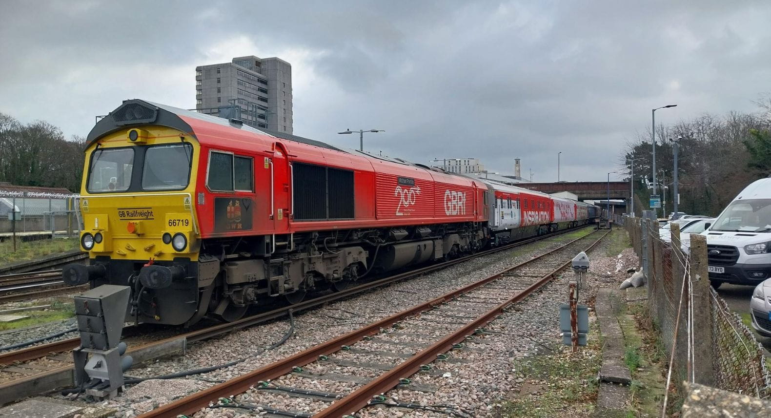 Red locomotive pulling Inspiration train 