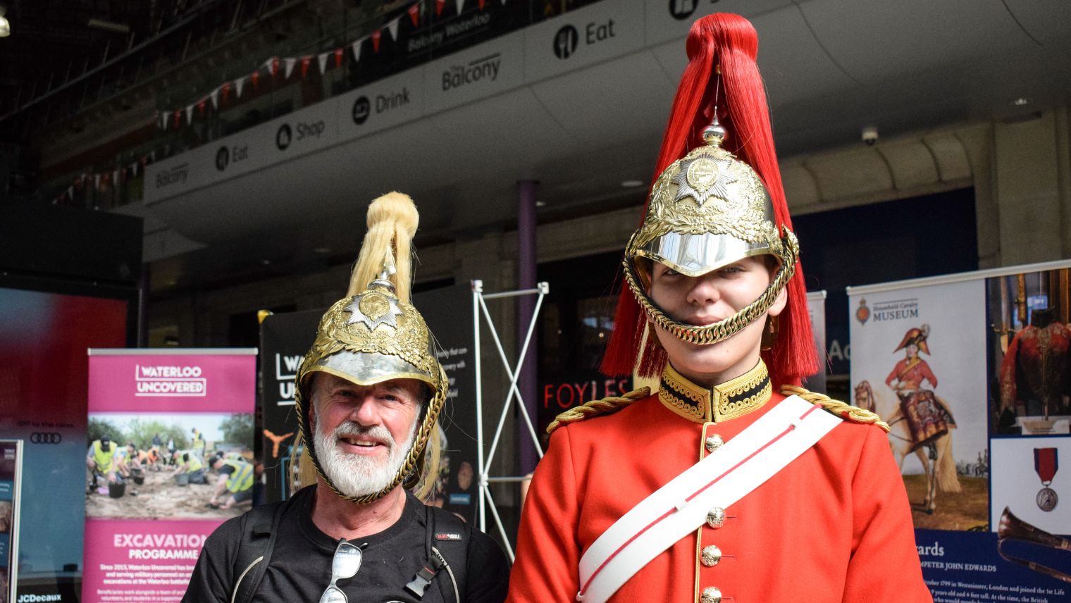 Life Guard Tpr Davis with SWR customer wearing helmet - Rail 200 - London Waterloo - South Western Railway