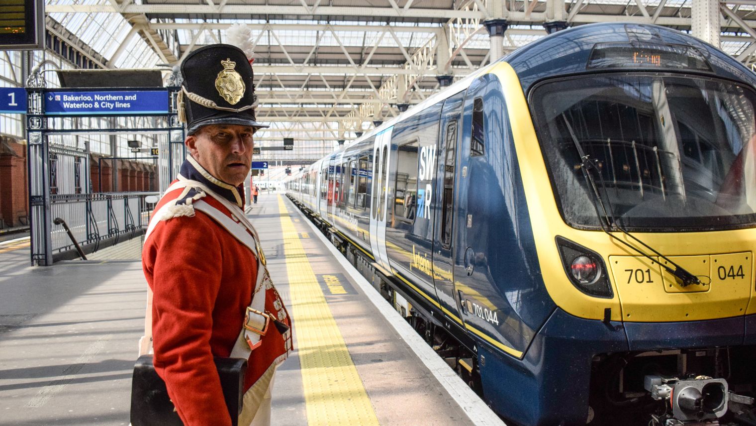 1815 Coldstream Guards reenactor Anthony with Arterio train - Rail 200 - London Waterloo - South Western Railway