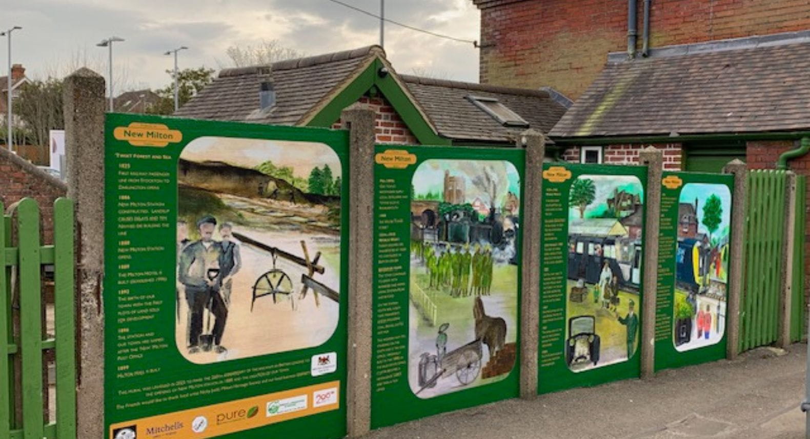 Series of fence panels painted with a mural