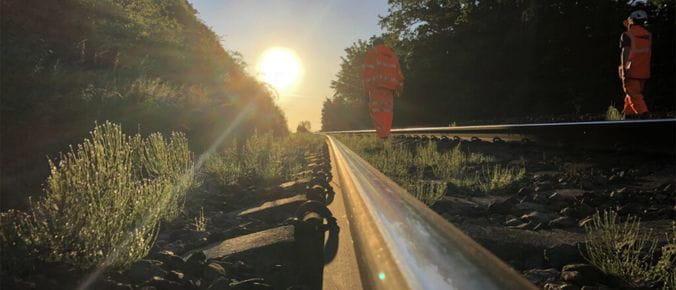 Extreme Hot Weather - picture of railway track with the sun in the background
