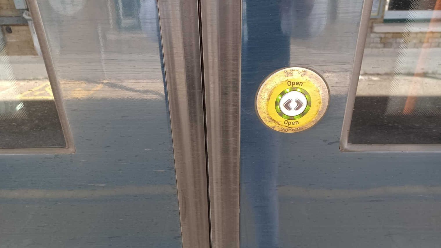 button on the door of the train