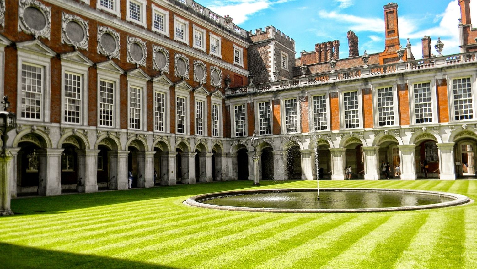 A grassed courtyard in Hampton Court Palace