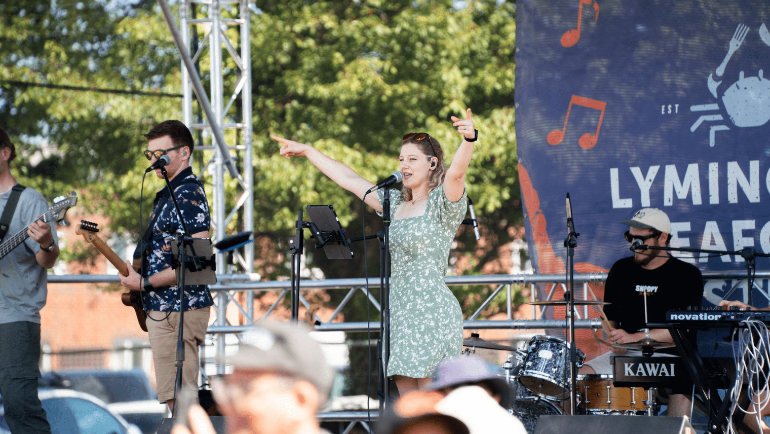 Live band performing on stage at Lymington Seafood Festival 