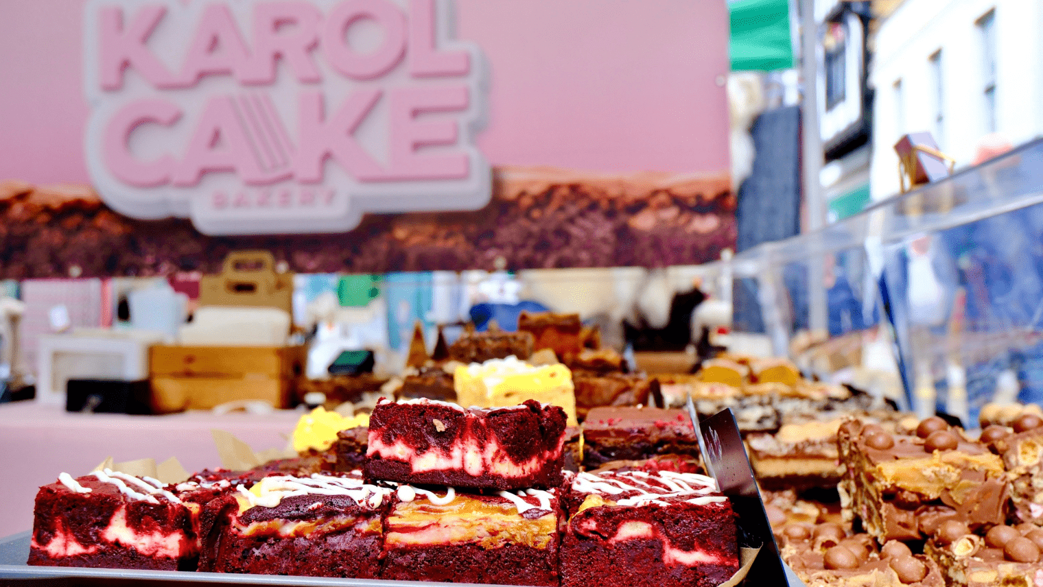 Inside of a market stall selling cakes 