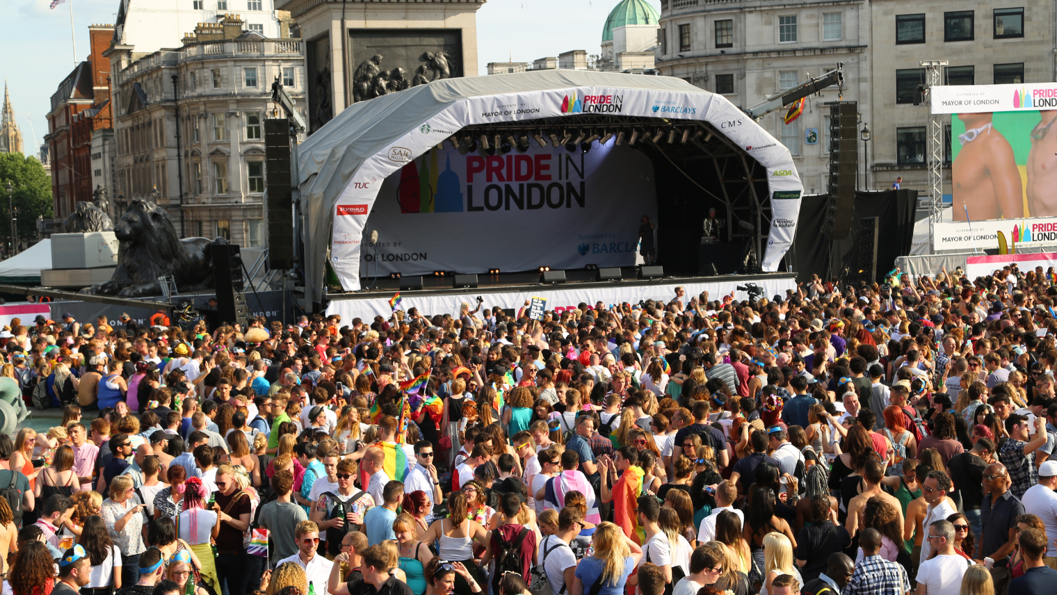 Image of a crowd in front of a  stage at London Pride