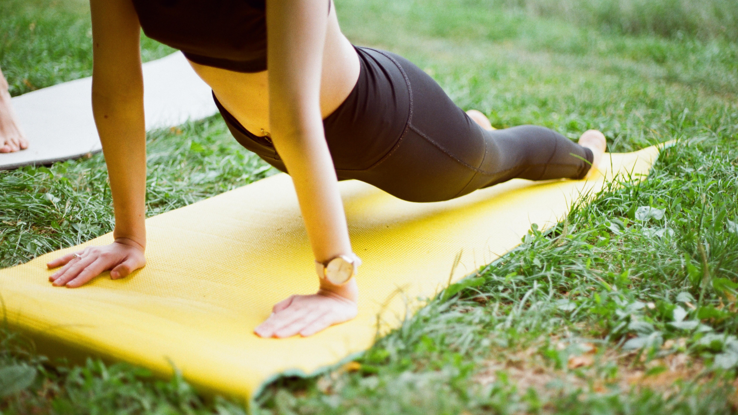 An image of a person doing yoga outside 