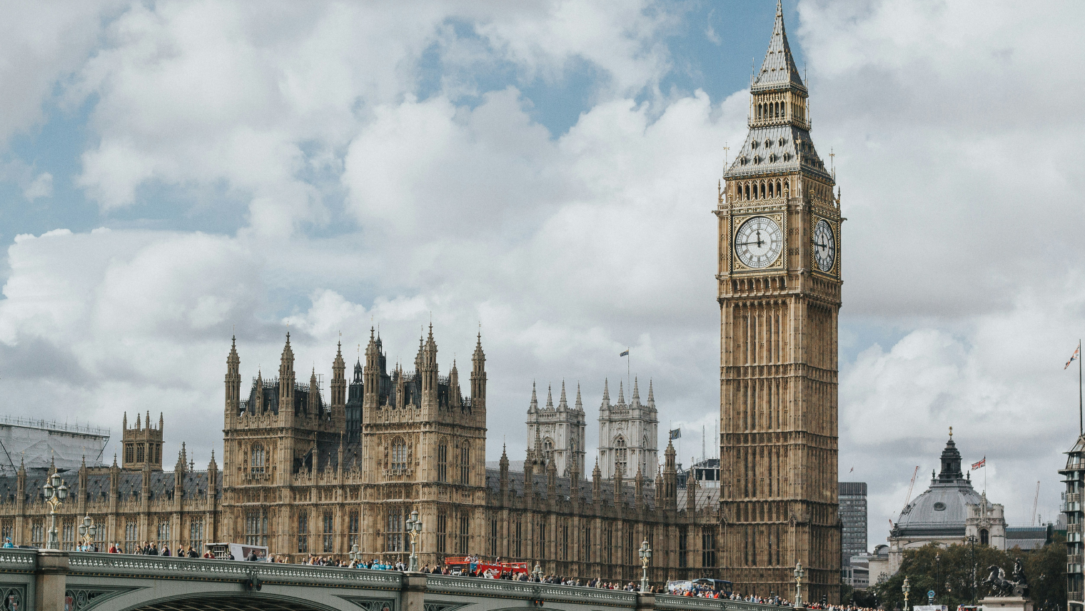 Big Ben and Westminster Bridge overlooking the River Thames on a cloudy day