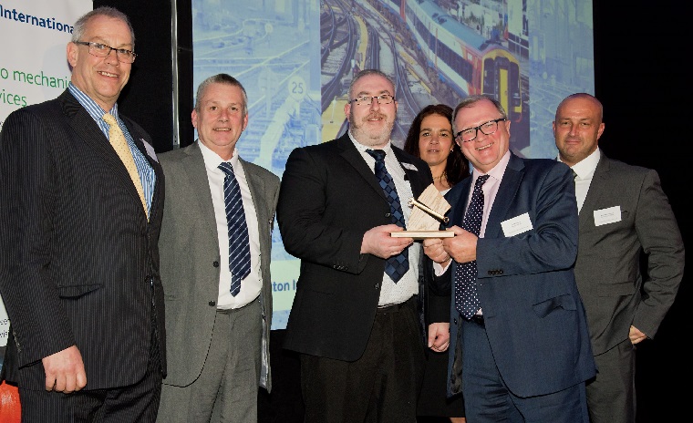 SWR staff collecting an award