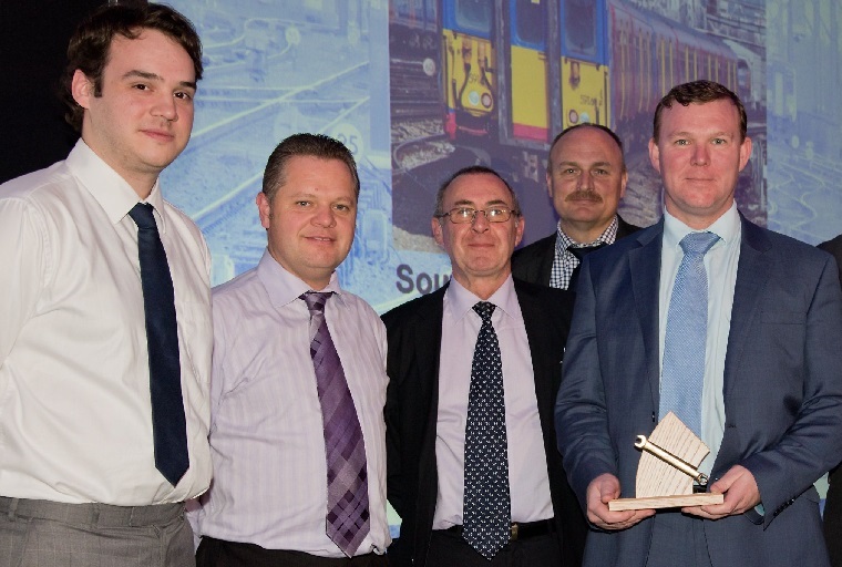 SWR staff collecting an award