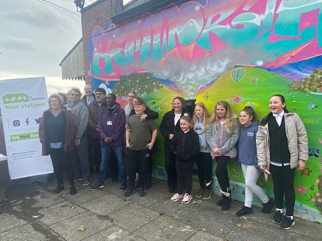 Hamworthy station mural with group of young people