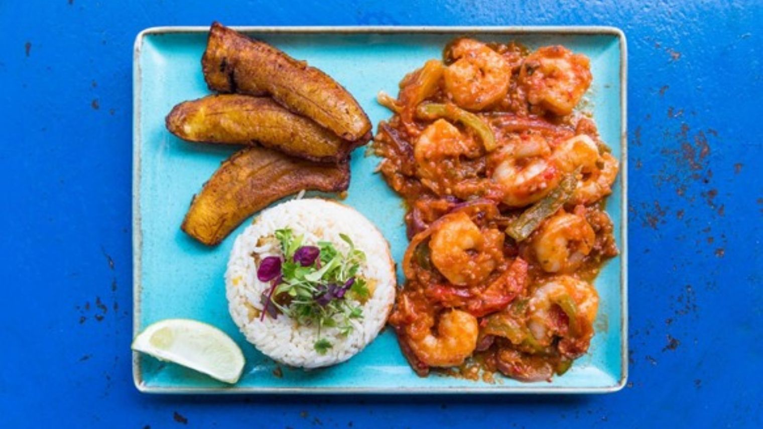 Food served on a plate at Cubana