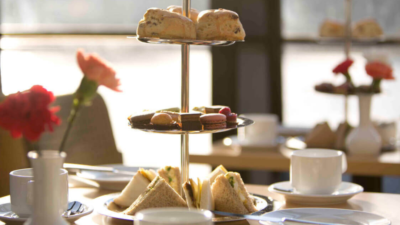 Afternoon tea served on a Thames Dinner Cruise