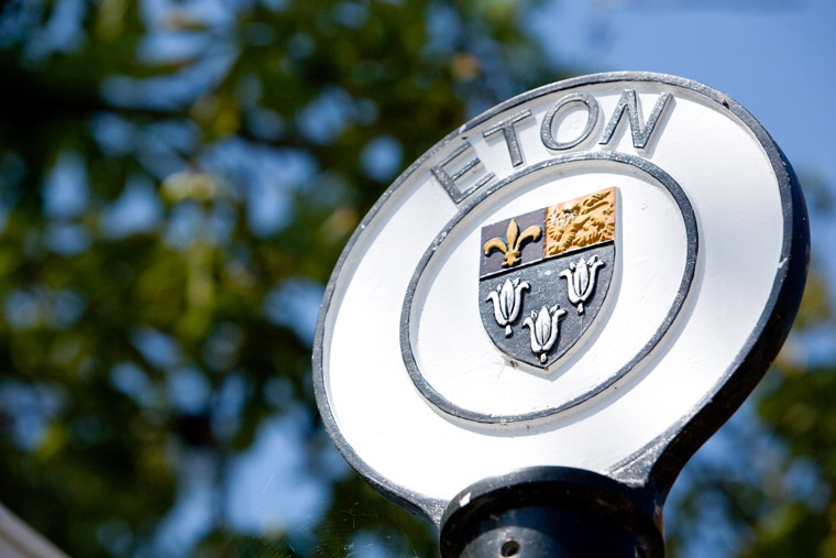 A small circular sign. On the outer circle is written 'ETON', in the centre is the town crest. Image courtesy windsor.gov.uk.
