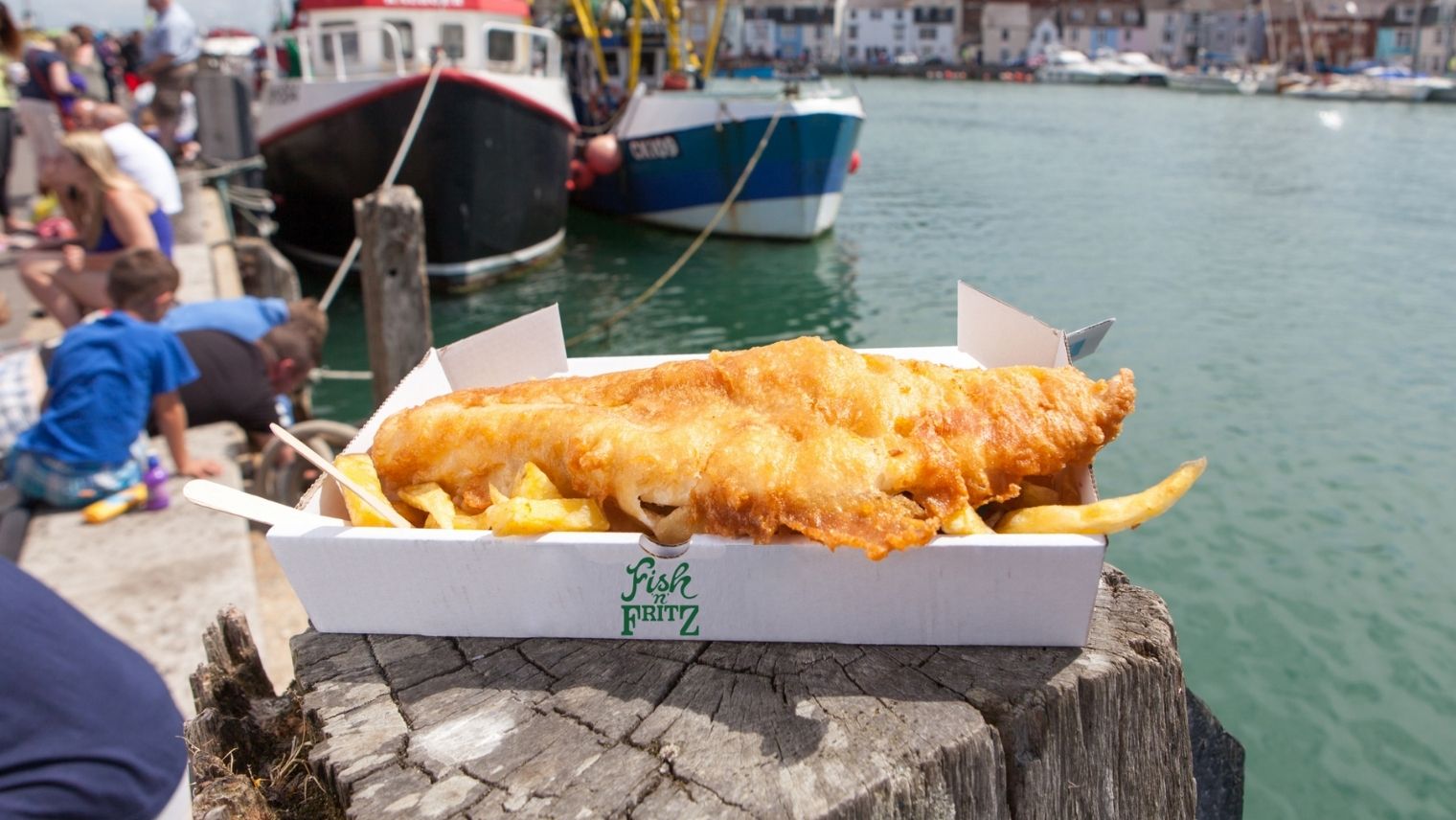 Fish and chips served by Fish 'n' Fritz seen on Weymouth seafront