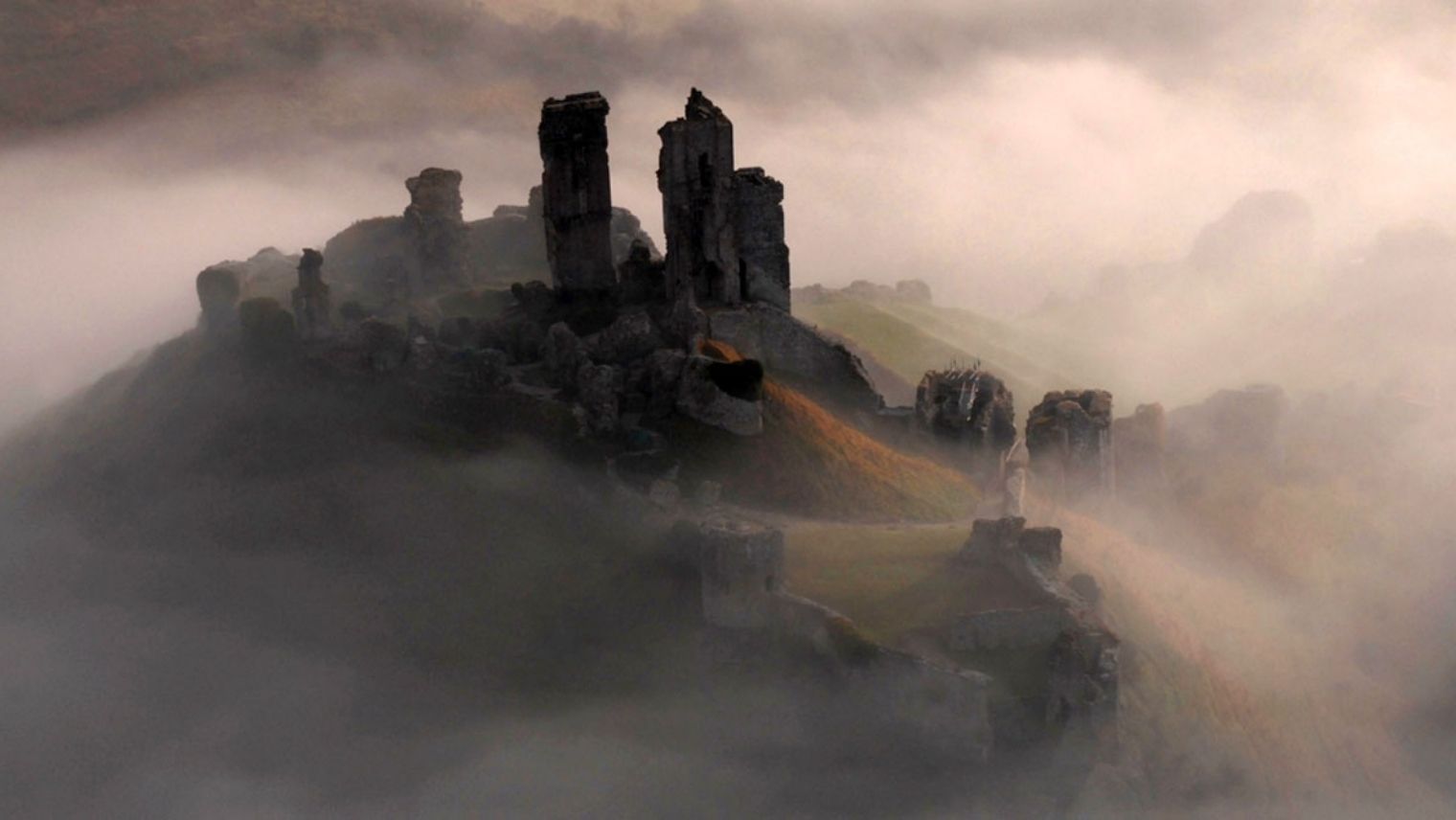 Corfe Castle seen in low cloud 